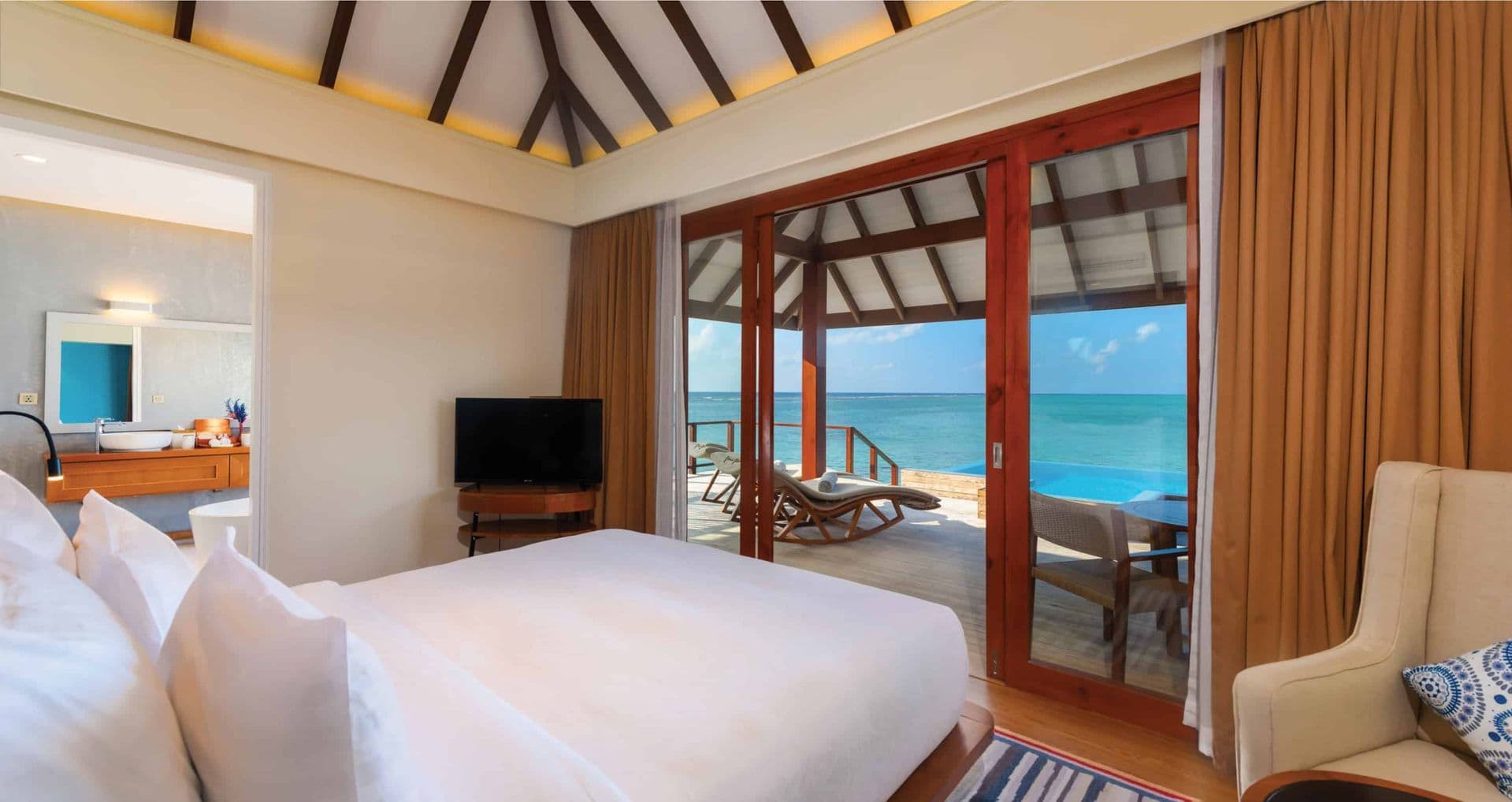 Experience the ultimate luxury with panoramic ocean views from our water pool villas in the Maldives, where your private cocoon features unrivaled tranquility.