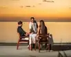 A couple enjoying the private dining at Varu By Atmosphere Maldives.